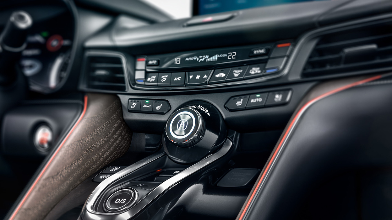 The control panel between the two front seats.